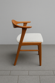 Set_of_4_Erik_Kirkegaard_dining_chairs_with_Bouclé_upholstery