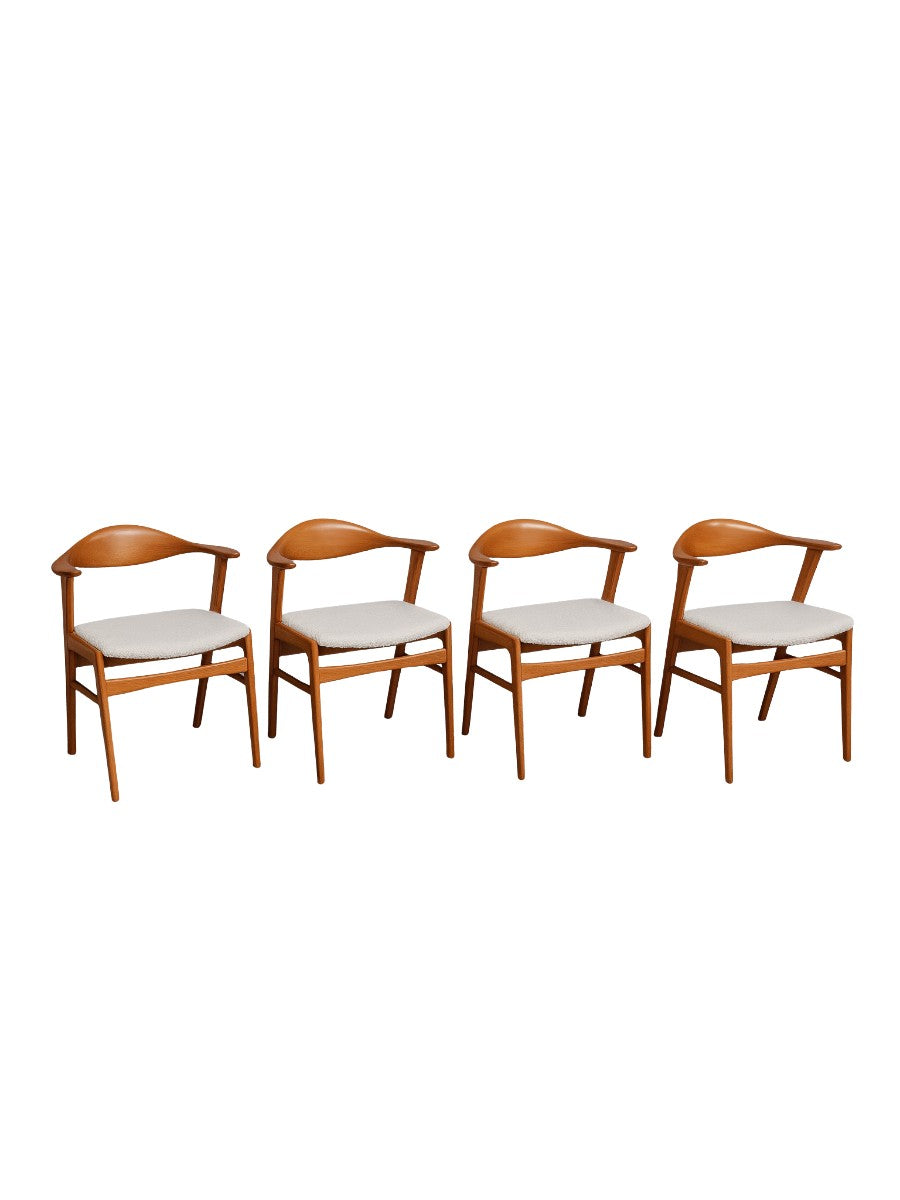 Set_of_4_Erik_Kirkegaard_dining_chairs_with_Bouclé_upholstery