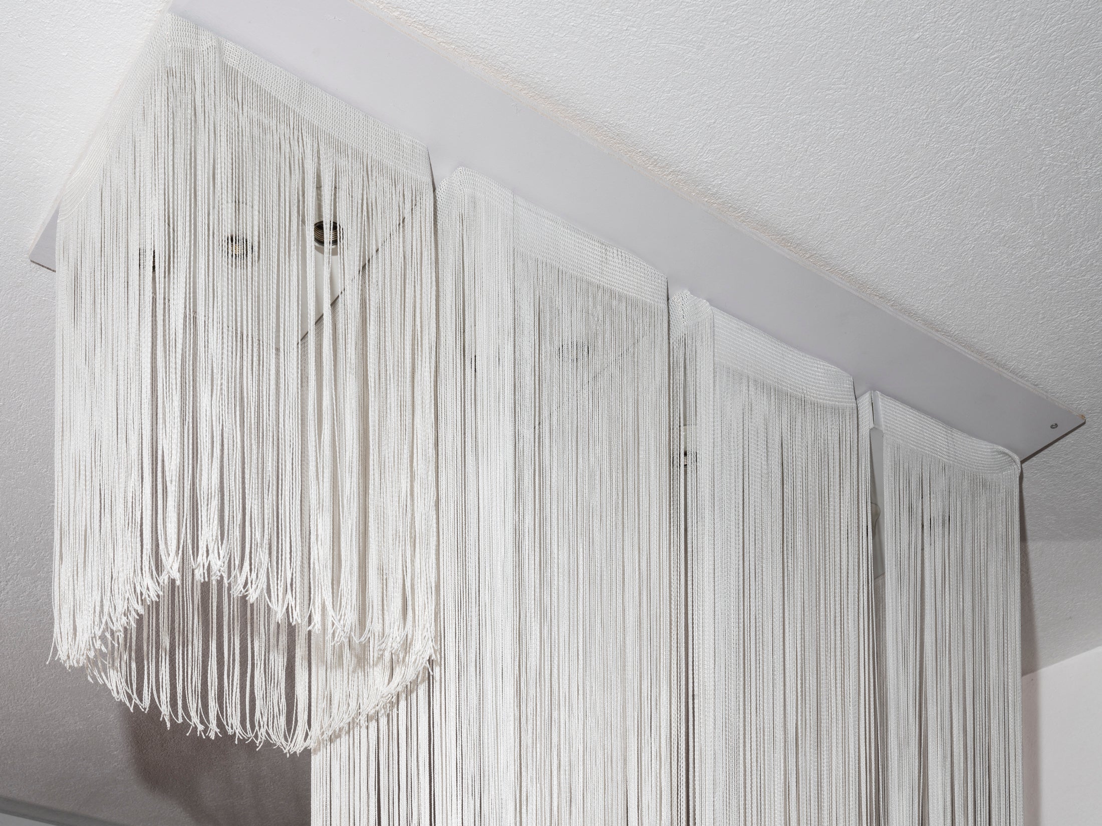 Set_of_4_Garbo_ceiling_lights_by_Mario_Yagi_for_Sirrah,_1970s