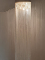 Set_of_4_Garbo_ceiling_lights_by_Mario_Yagi_for_Sirrah,_1970s