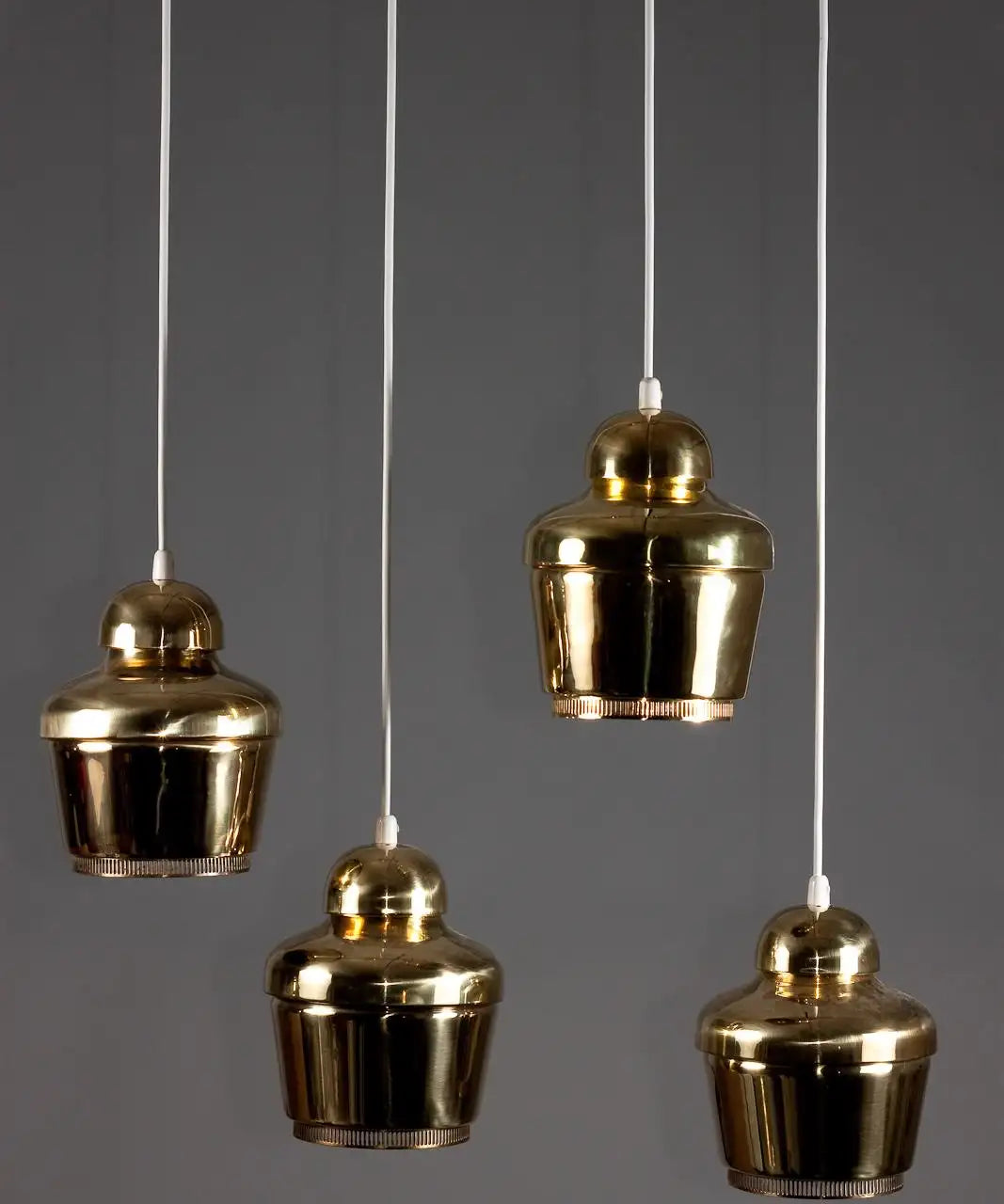 Set_of_4_Golden_Bell_A330_Pendant_Lamps_Alvar_Aalto_Brass_Valaistystyö_Ky_1950s_Finland