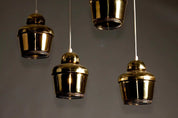 Set_of_4_Golden_Bell_A330_Pendant_Lamps_Alvar_Aalto_Brass_Valaistystyö_Ky_1950s_Finland