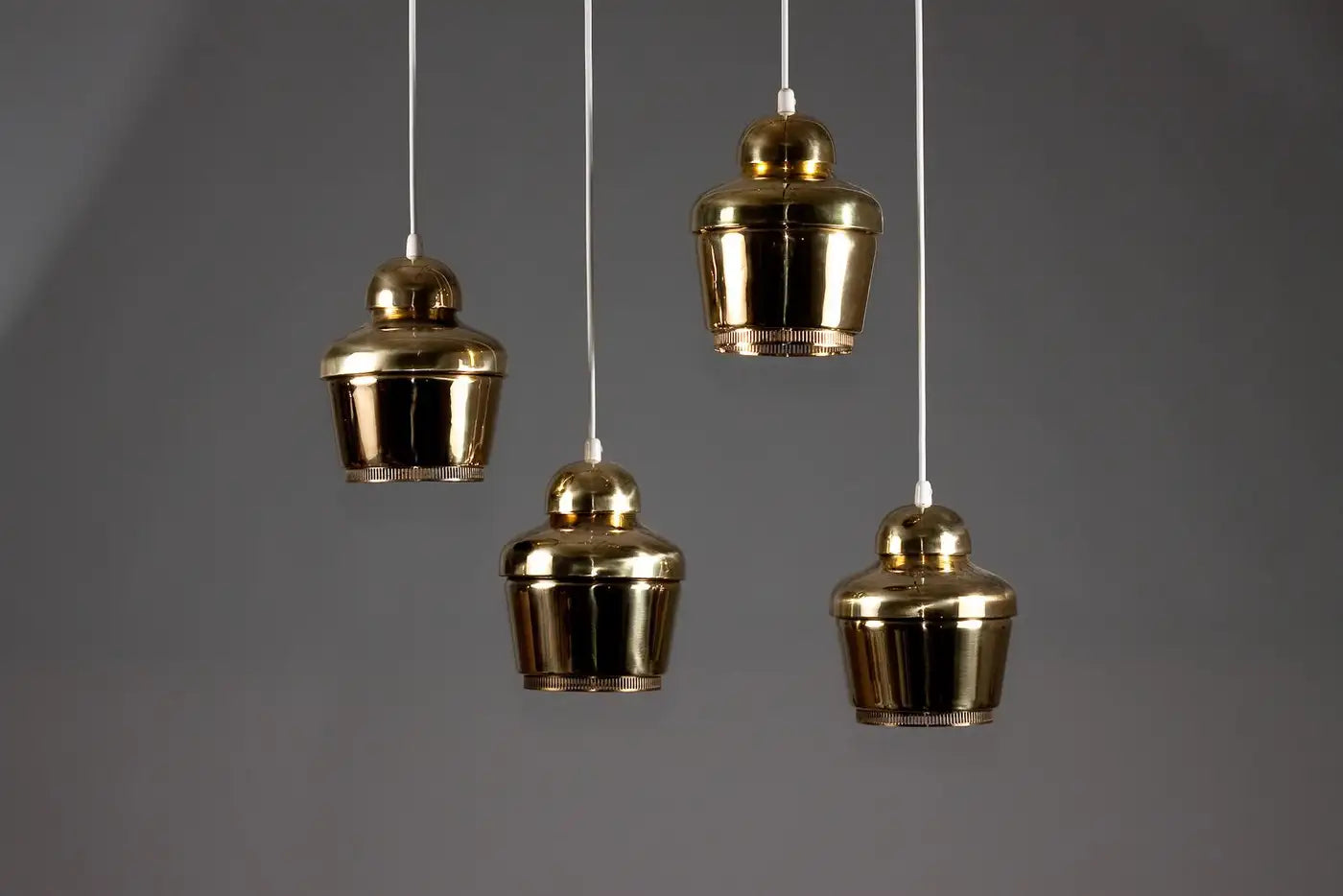 Set_of_4_Golden_Bell_A330_Pendant_Lamps_Alvar_Aalto_Brass_Valaistystyö_Ky_1950s_Finland