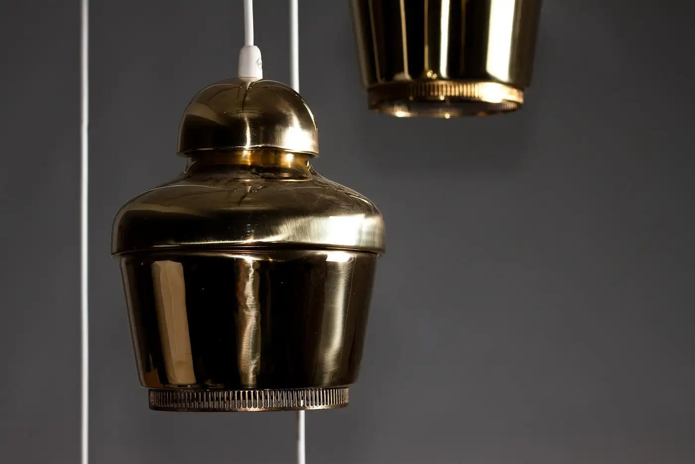 Set_of_4_Golden_Bell_A330_Pendant_Lamps_Alvar_Aalto_Brass_Valaistystyö_Ky_1950s_Finland