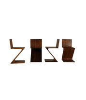 Set_of_4_Handcrafted_Zig-Zag_Chairs_After_Gerrit_Rietveld_in_Dark-Stained_Solid_Wood