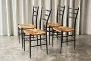 Set_of_4_Spinetto_Dining_Chairs_in_Ebonised_Straw_by_Chiavarine_Fratelli,_1950s