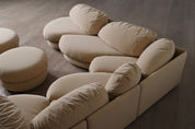 Set_of_5_units_of_Sculptural_sofa_and_2_ottomans_in_beige_by_Wiener_Werkstätte,_Austria_1970s