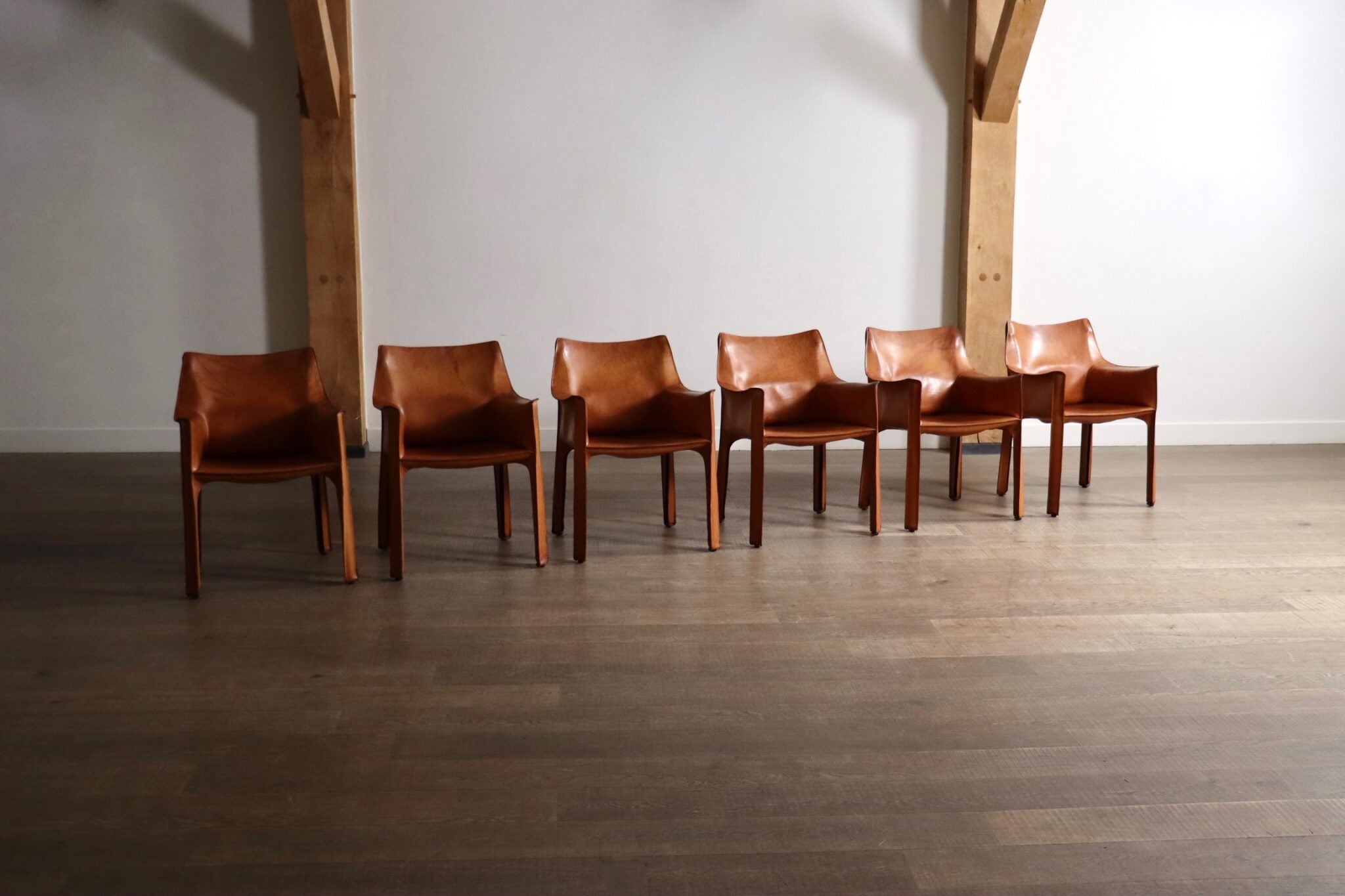Set_of_6_Cassina_CAB_Dining_Chairs_with_Armrests_in_Cognac_Leather_by_Mario_Bellini,_Italy_1970s