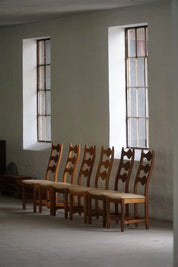 Set_of_6_Henning_Kjærnulf_Oak_Dining_Chairs_with_Hessian_Upholstery,_Denmark,_1950s
