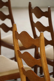 Set_of_6_Henning_Kjærnulf_Oak_Dining_Chairs_with_Hessian_Upholstery,_Denmark,_1950s