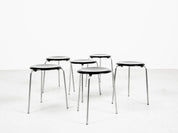 Set_of_6_Midcentury_Dot_stools_in_black_by_Arne_Jacobsen_for_Fritz_Hansen,_1964