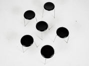 Set_of_6_Midcentury_Dot_stools_in_black_by_Arne_Jacobsen_for_Fritz_Hansen,_1964