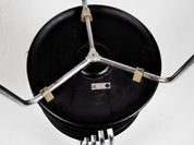 Set_of_6_Midcentury_Dot_stools_in_black_by_Arne_Jacobsen_for_Fritz_Hansen,_1964