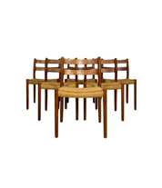 Set_of_6_Model_84_Teak_Dining_Chairs_by_Niels_Otto_Møller_for_J.L._Møller,_Papercord_Seats,_Denmark,_1960s