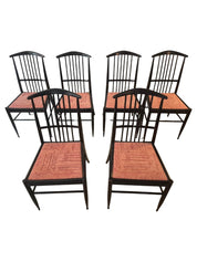 Set_of_6_Scandinavian_Modern_Chairs_model_Charlotte,_black_lacqured_wood