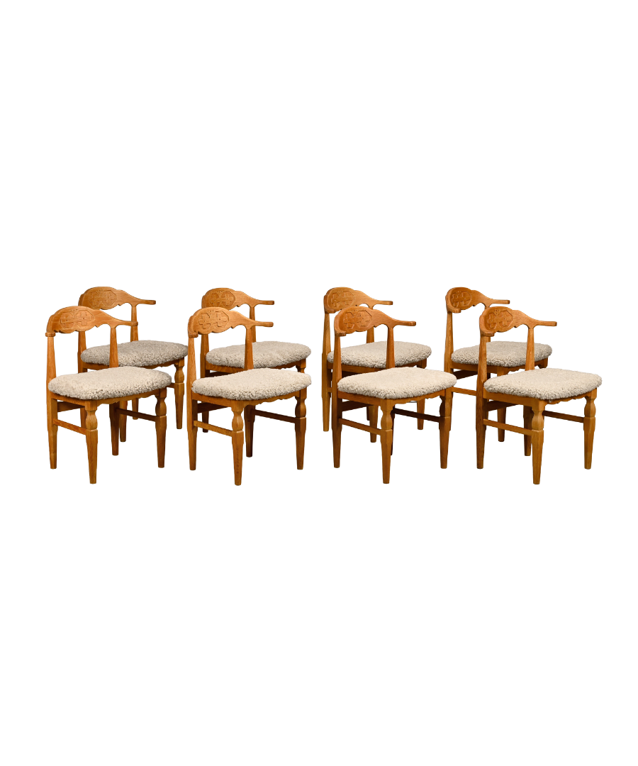 Set_of_8_Brutalist_Oak_Dining_Chairs_by_Henning_Kjærnulf_for_EG_Kvalitetsmøbel,_Off-White_Sheepskin,_Denmark,_1960s