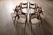 Set_of_8_Hans_Wegner_CH29_Sawbuck_Dining_Chairs_for_Carl_Hansen_&_Son,_1952,_Denmark