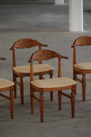Set_of_8_Henning_Kjærnulf_Hessian_Dining_Chairs,_Danish_Modern_Design