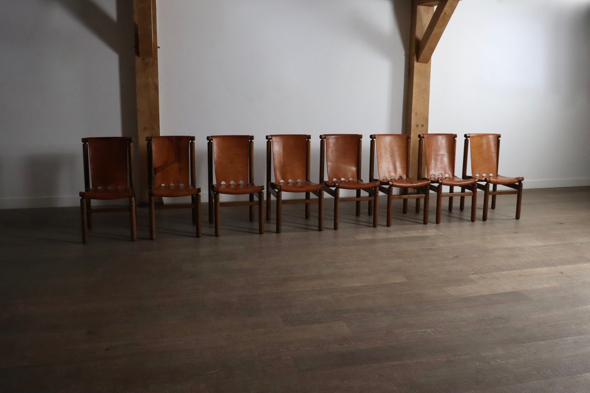 Set_of_8_Ilmari_Tapiovaara_dining_chairs_for_La_Permanente_Mobili_Cantù,_1960s