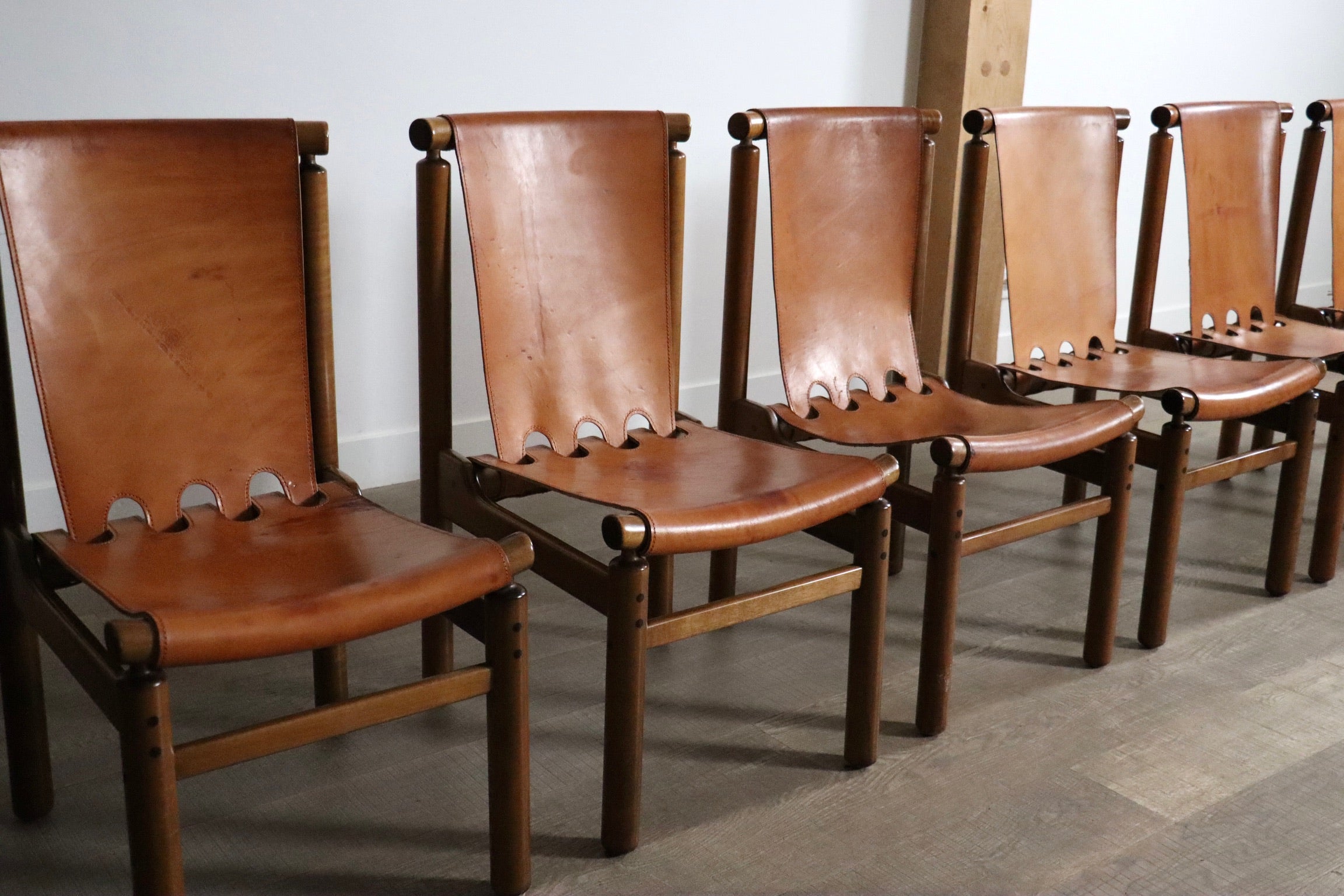 Set_of_8_Ilmari_Tapiovaara_dining_chairs_for_La_Permanente_Mobili_Cantù,_1960s