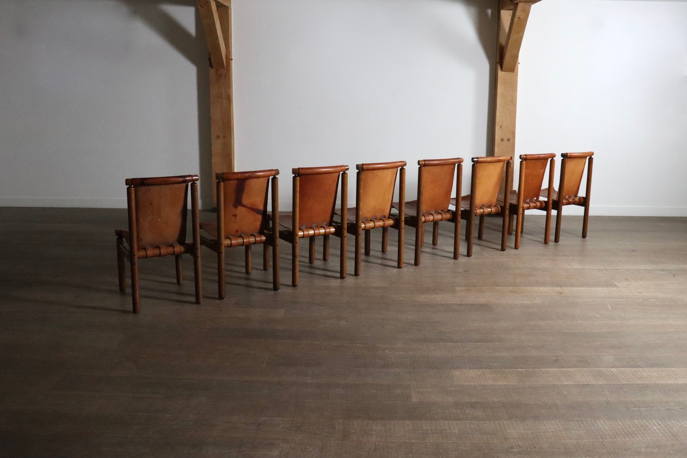 Set_of_8_Ilmari_Tapiovaara_dining_chairs_for_La_Permanente_Mobili_Cantù,_1960s