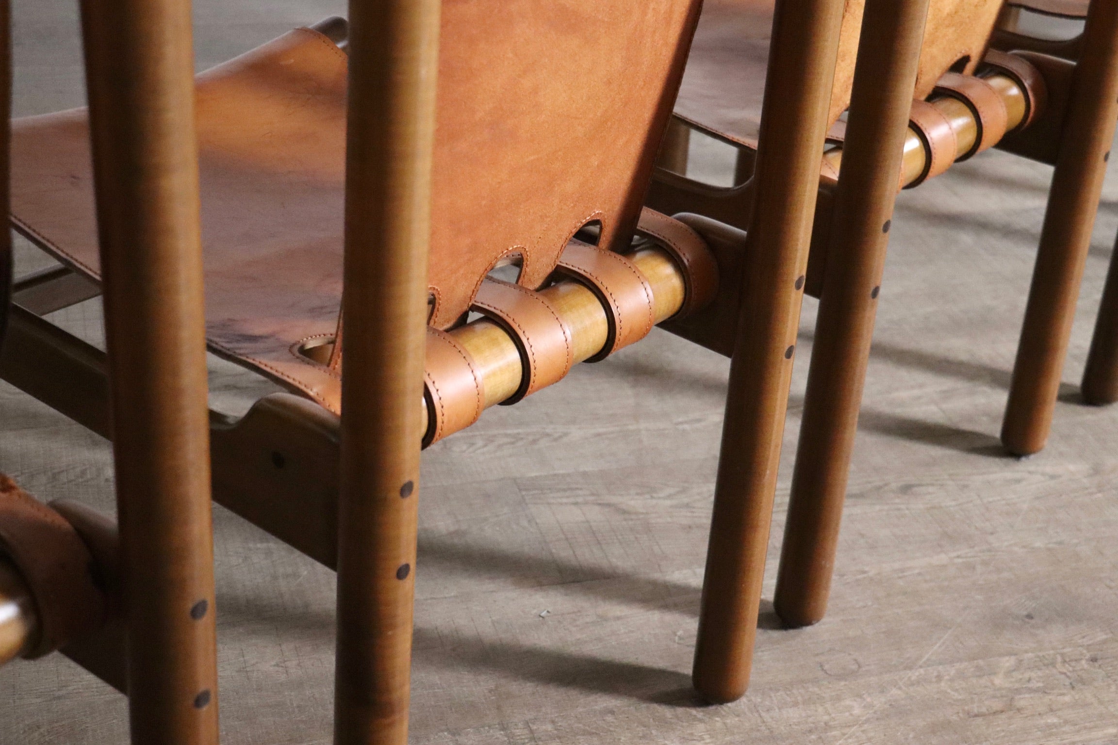 Set_of_8_Ilmari_Tapiovaara_dining_chairs_for_La_Permanente_Mobili_Cantù,_1960s