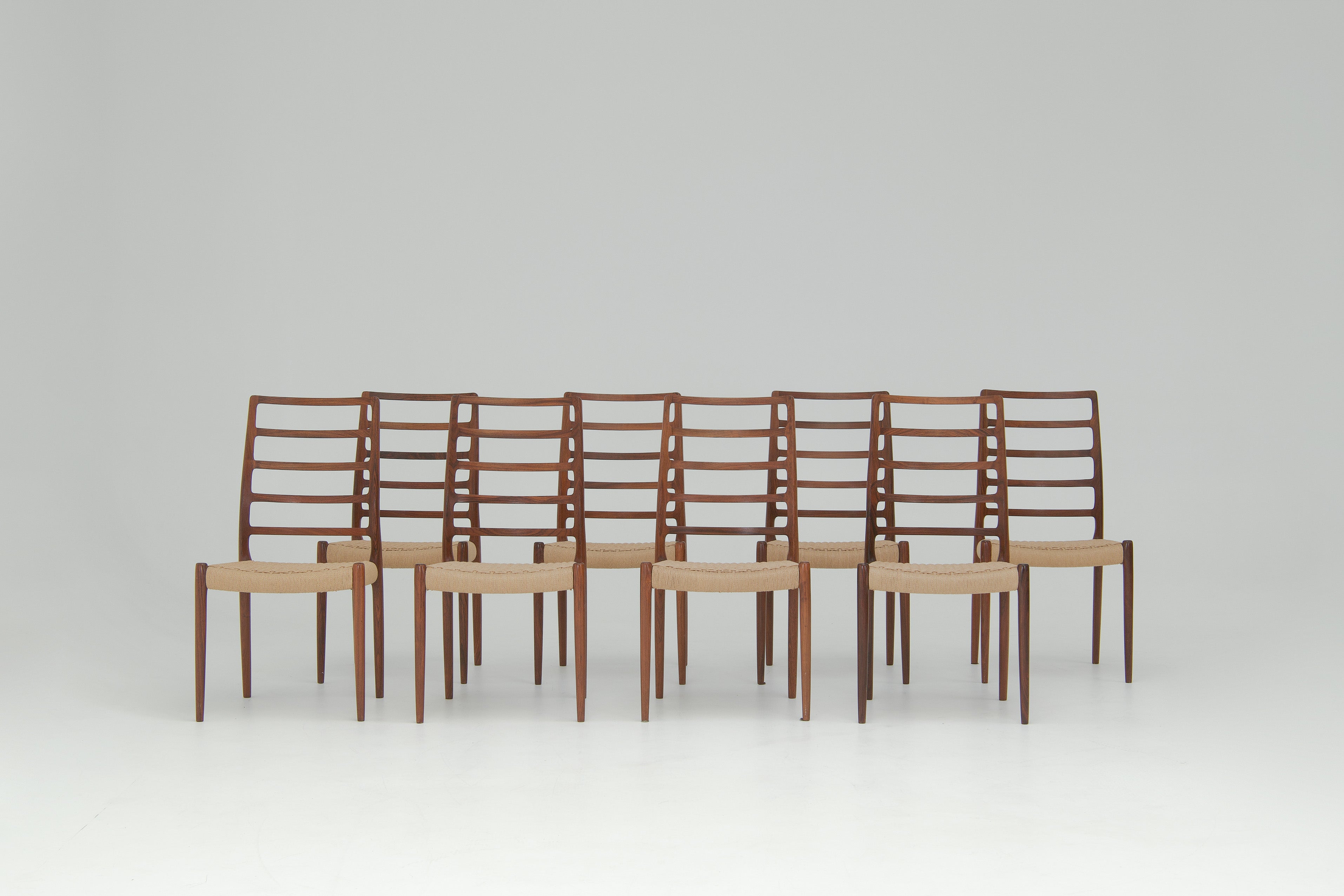 Set_of_8_Model_82_Dining_Chairs_by_Niels_O._Møller_for_J.L._Møllers_Møbelfabrik,_Mid_Century_Modern,_1960s,_Denmark
