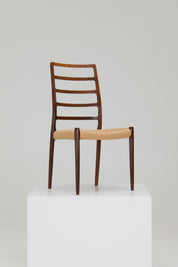 Set_of_8_Model_82_Dining_Chairs_by_Niels_O._Møller_for_J.L._Møllers_Møbelfabrik,_Mid_Century_Modern,_1960s,_Denmark