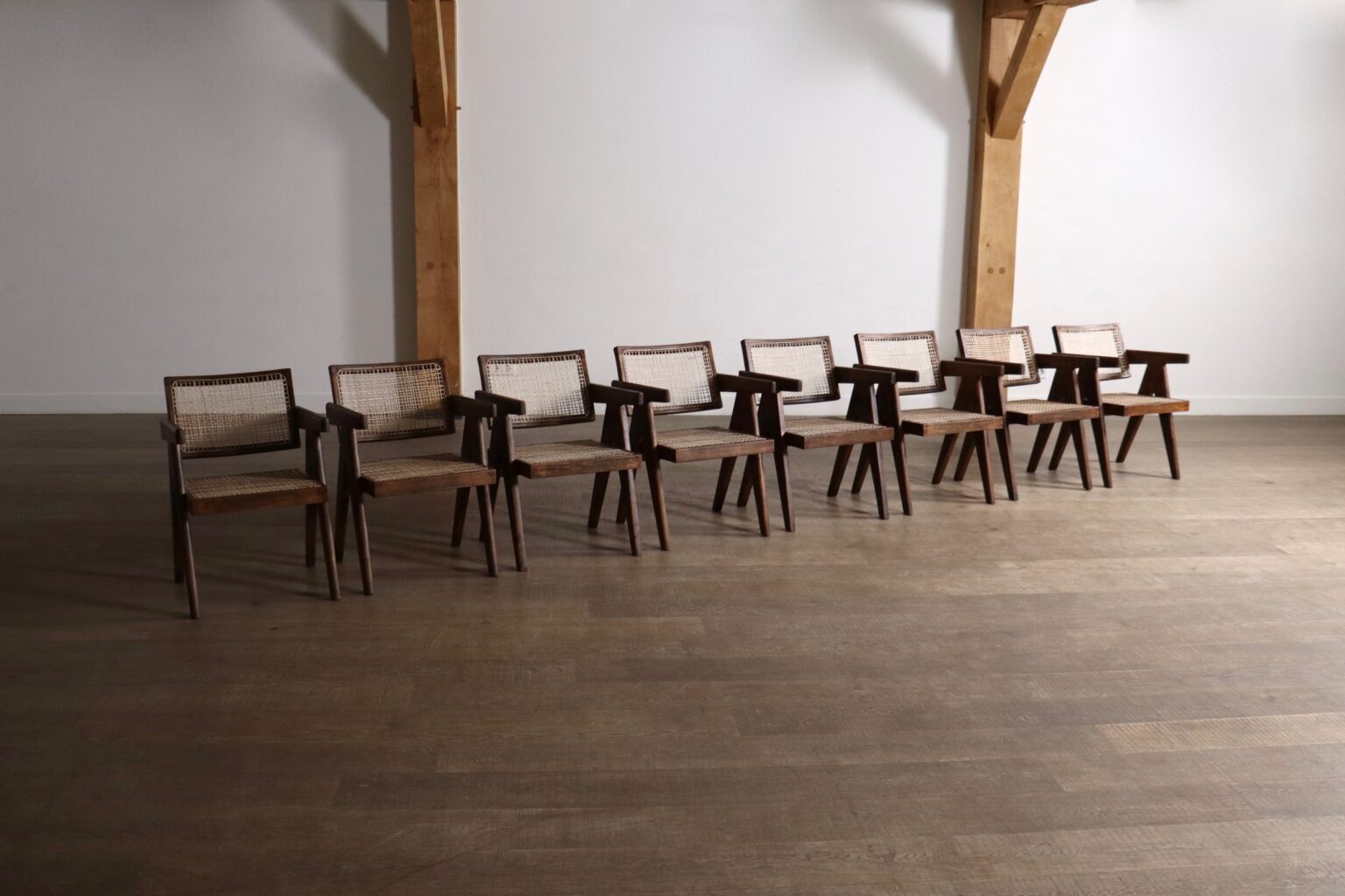 Set_of_8_Pierre_Jeanneret_Office_Cane_Chairs_in_Teak,_Chandigarh,_India,_1950s