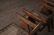 Set_of_8_Pierre_Jeanneret_Office_Cane_Chairs_in_Teak,_Chandigarh,_India,_1950s