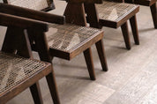 Set_of_8_Pierre_Jeanneret_Office_Cane_Chairs_in_Teak,_Chandigarh,_India,_1950s