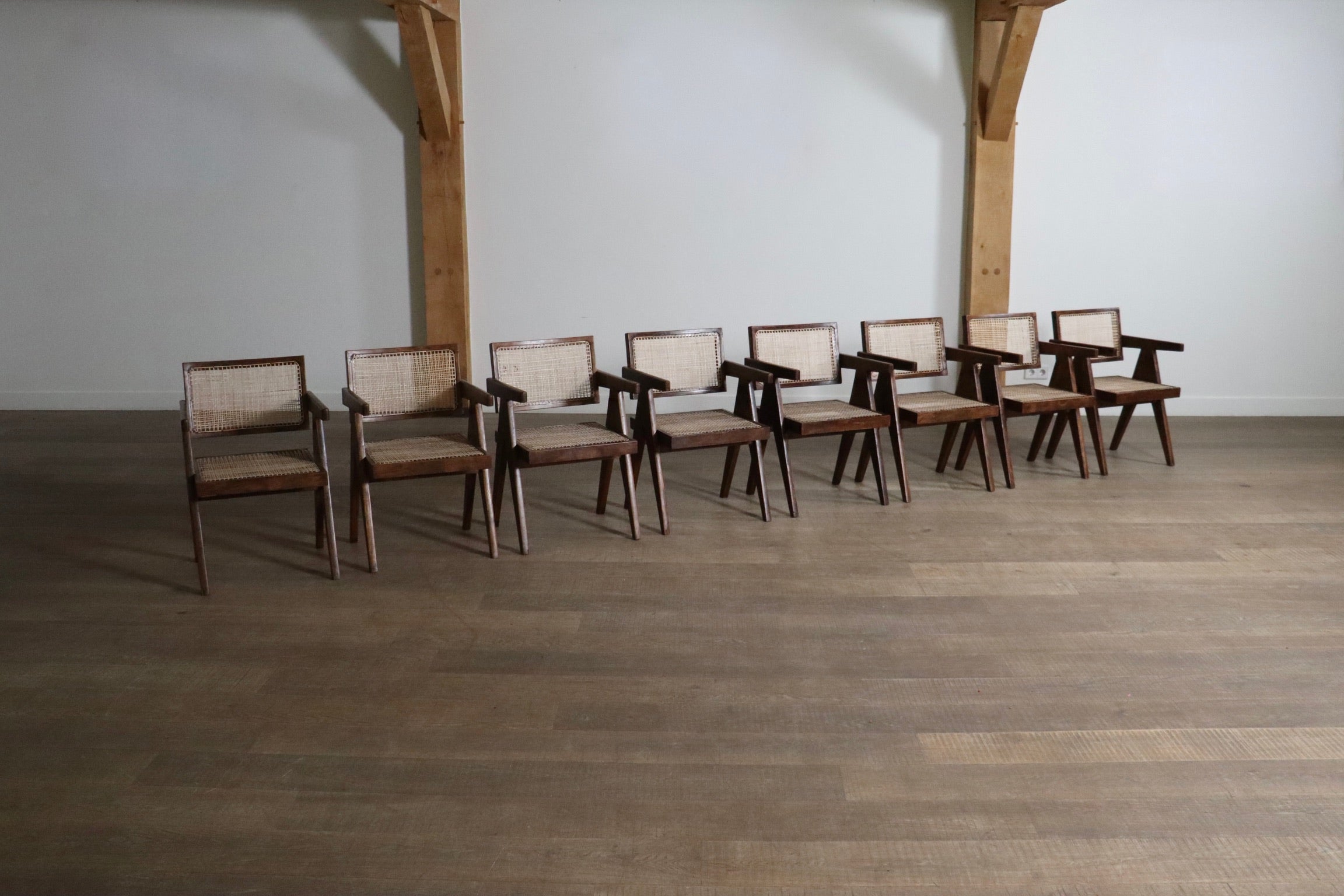 Set_of_8_Pierre_Jeanneret_Office_Cane_Chairs,_India_1950s