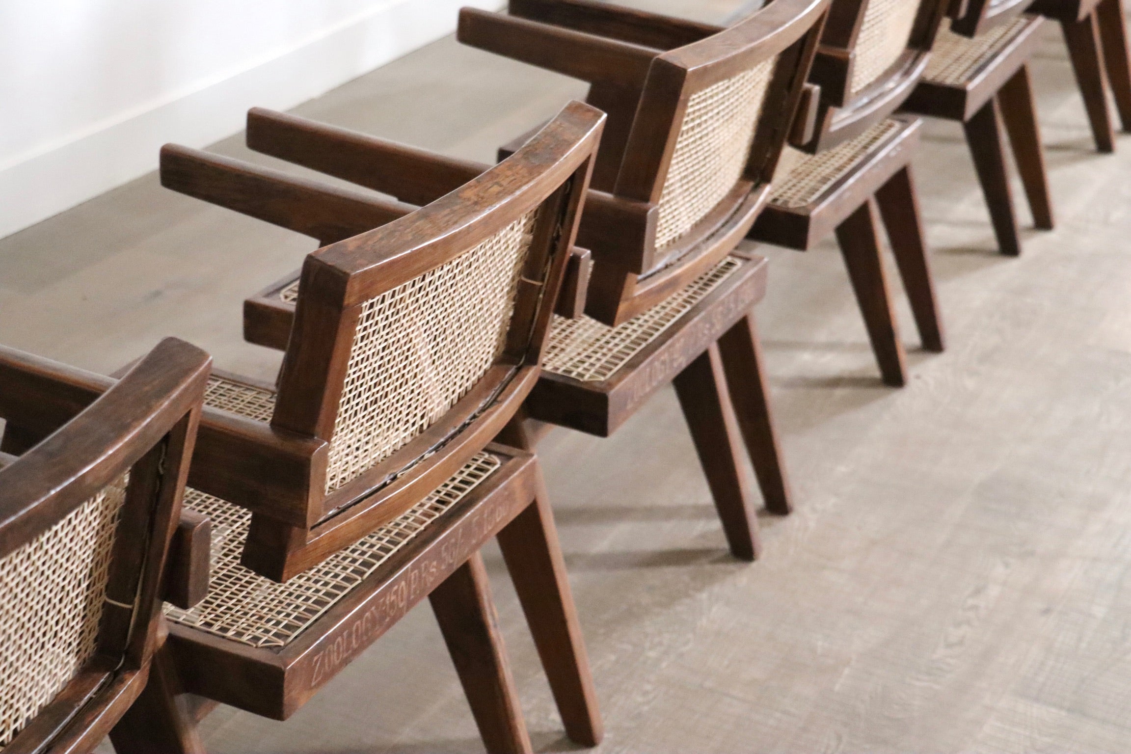 Set_of_8_Pierre_Jeanneret_Office_Cane_Chairs,_India_1950s