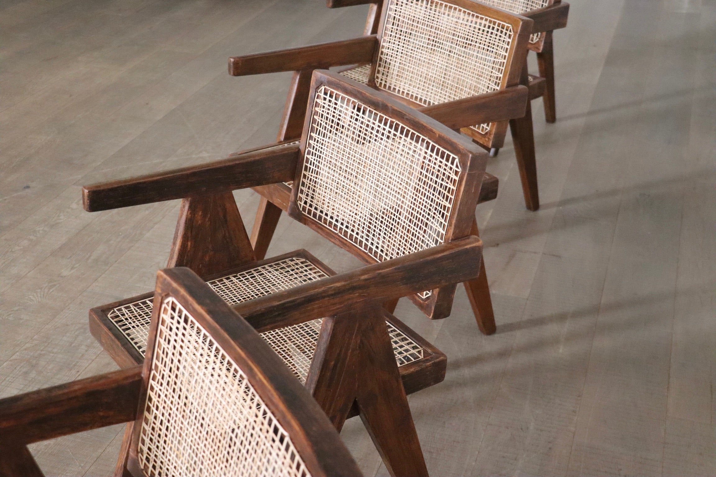 Set_of_8_Pierre_Jeanneret_Office_Cane_Chairs,_India_1950s