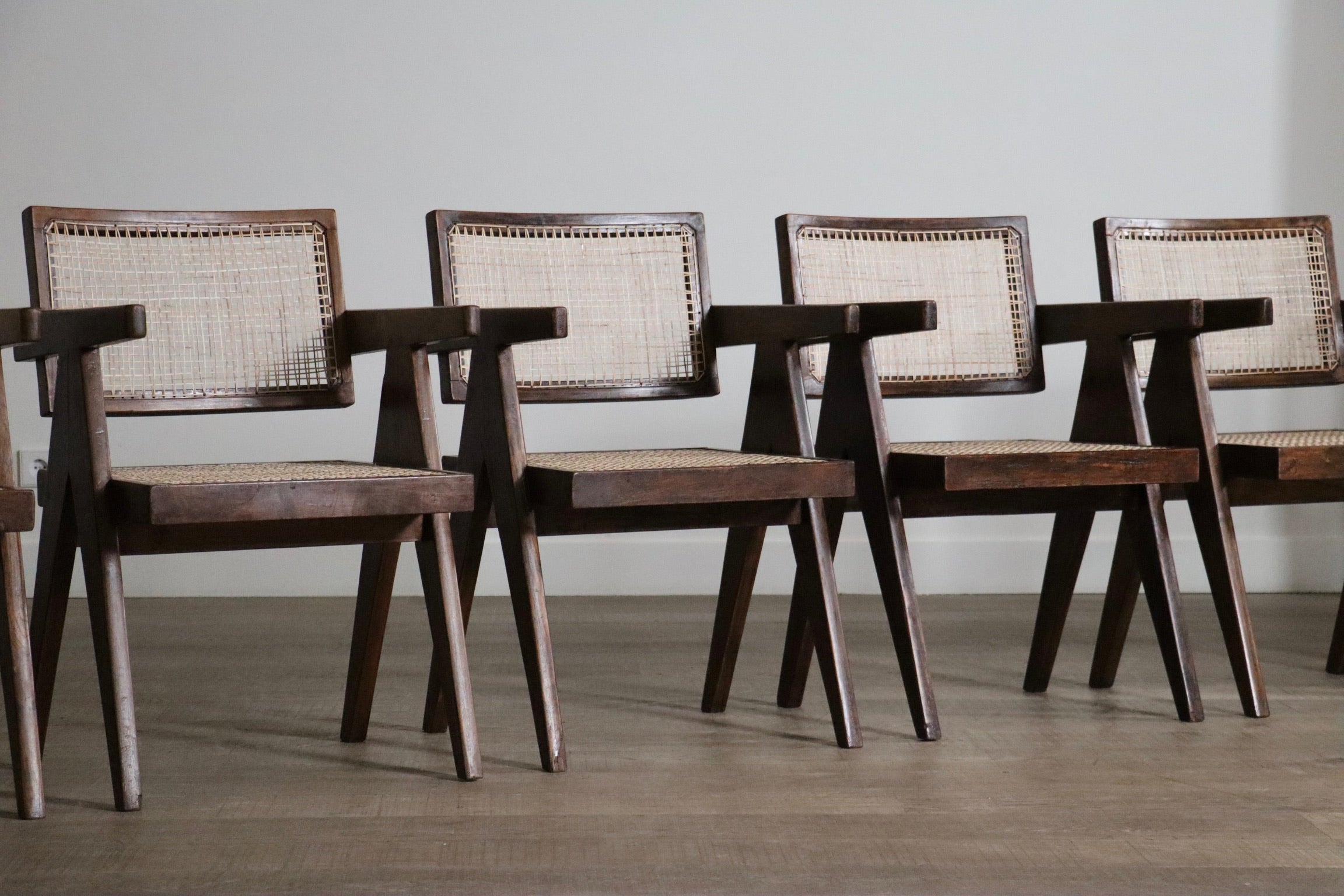 Set_of_8_Pierre_Jeanneret_Office_Cane_Chairs,_India_1950s