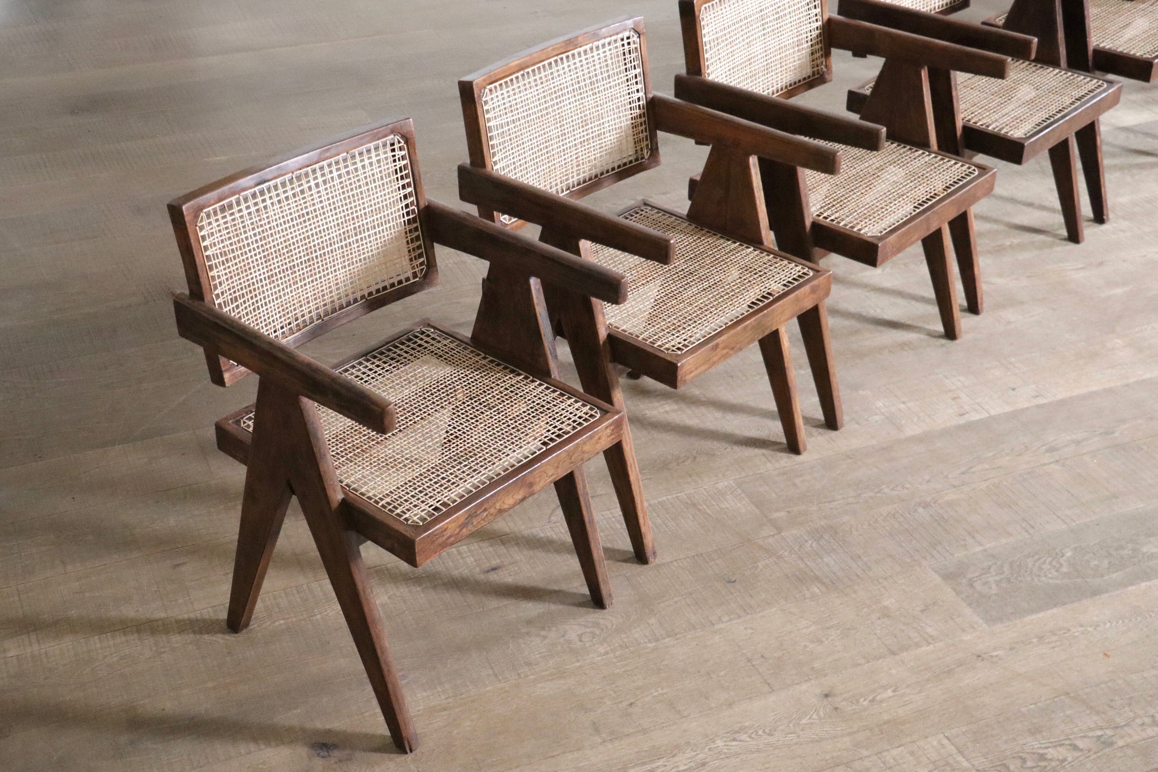 Set_of_8_Pierre_Jeanneret_Office_Cane_Chairs,_India_1950s