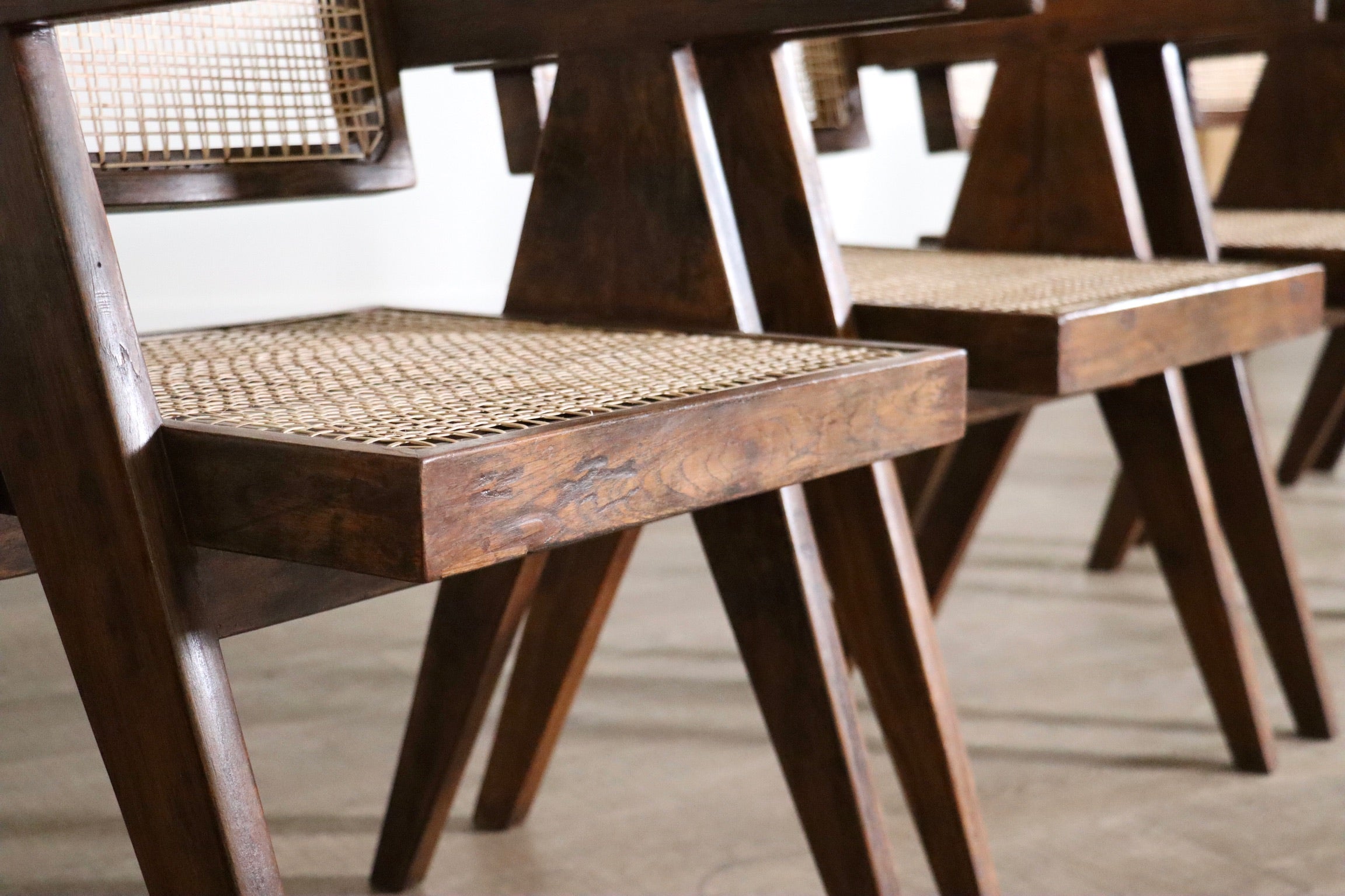 Set_of_8_Pierre_Jeanneret_Office_Cane_Chairs,_India_1950s