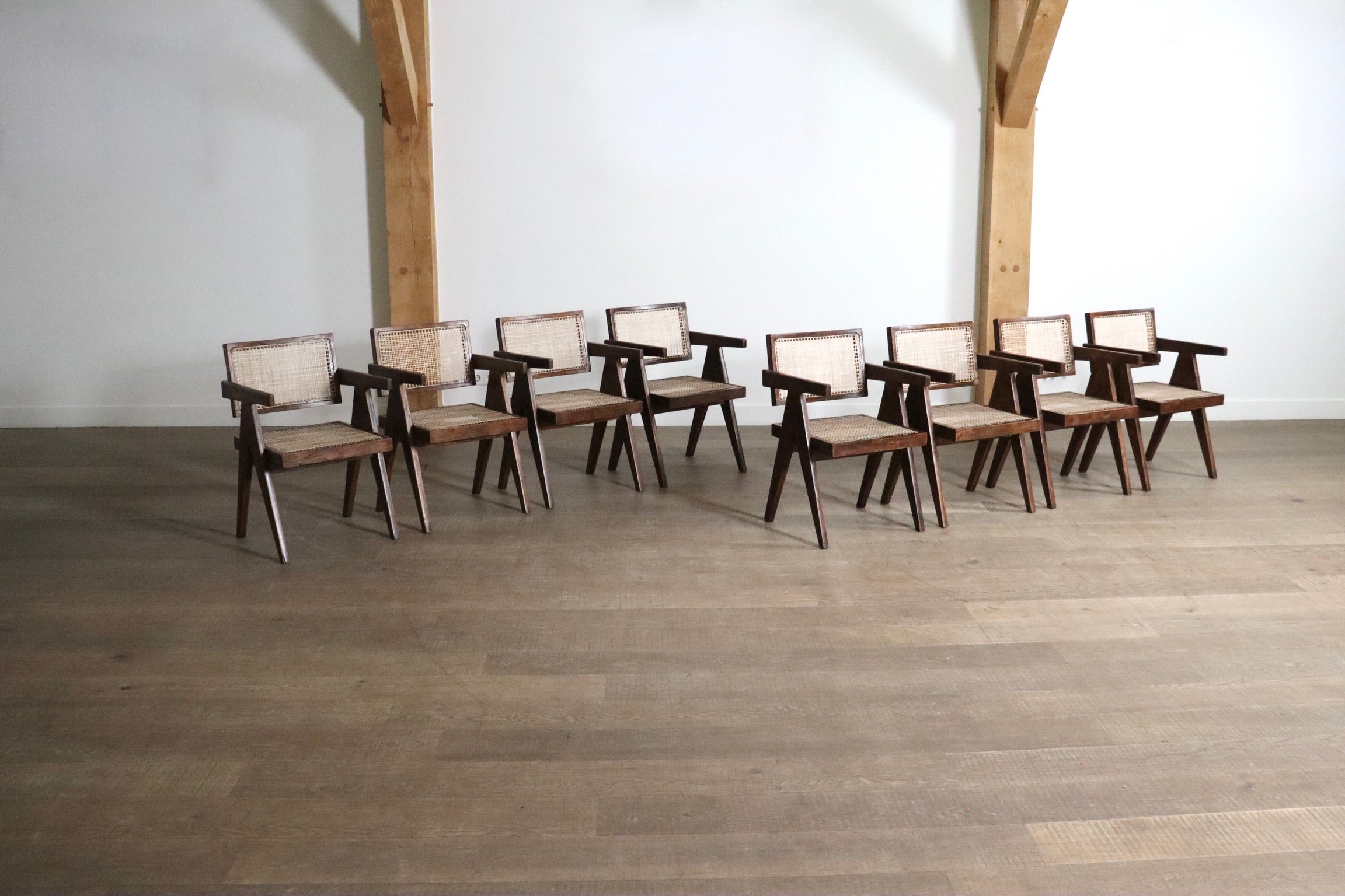 Set_of_8_Pierre_Jeanneret_Office_Cane_Chairs,_India_1950s