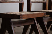 Set_of_8_Pierre_Jeanneret_PJ-SI-25-A_Student_Chairs_in_Teak_and_Cane,_Chandigarh,_1958–59