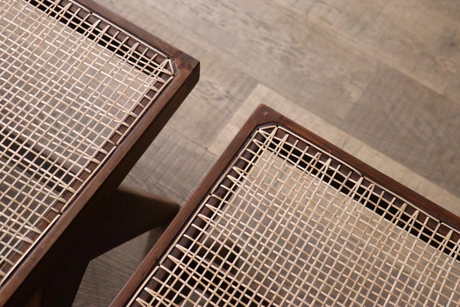 Set_of_8_Pierre_Jeanneret_PJ-SI-25-A_Student_Chairs_in_Teak_and_Cane,_Chandigarh,_1958–59
