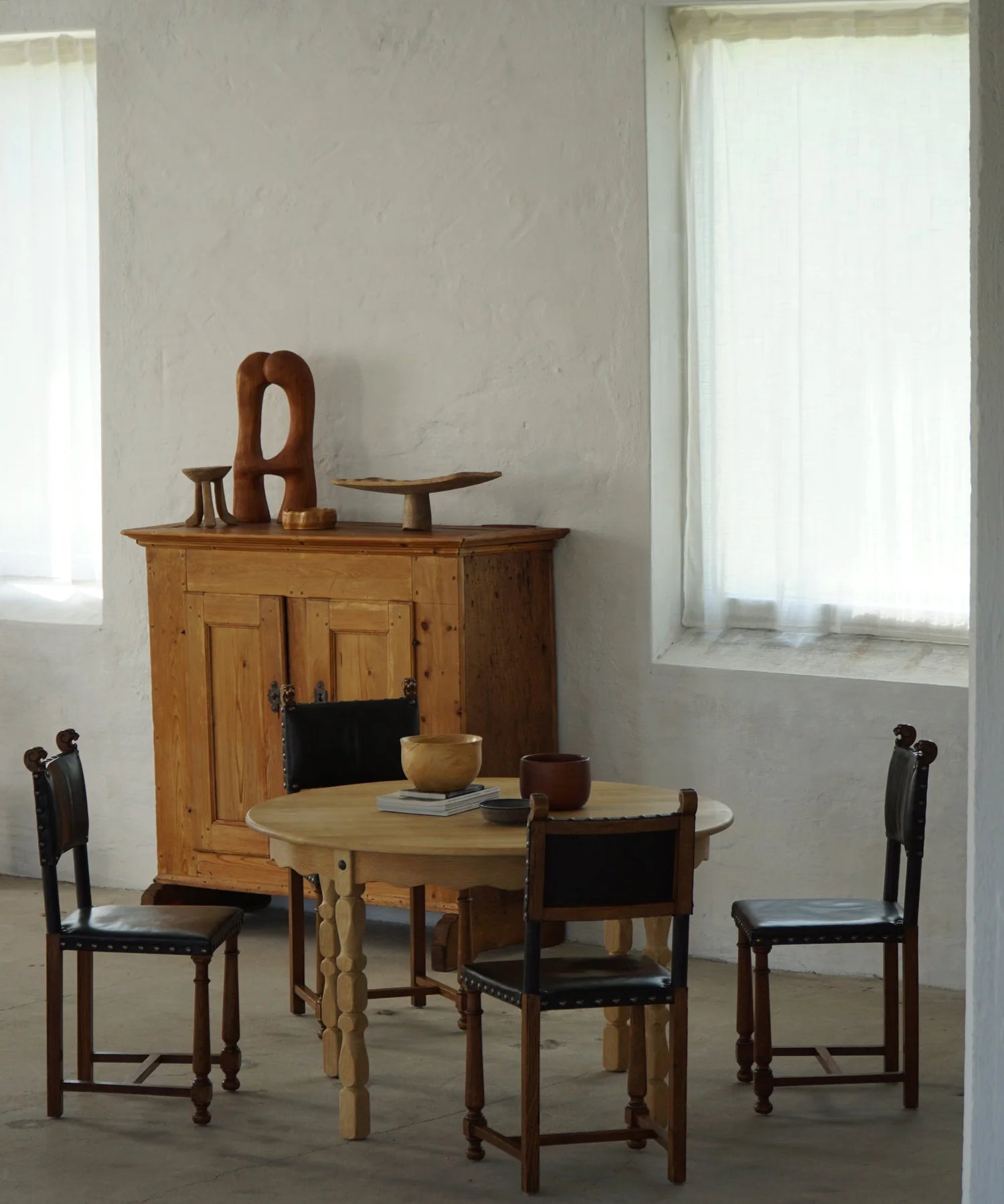Set_of_8_Swedish_Grace_Dining_Chairs_in_Leather,_Sweden_1920s–1930s