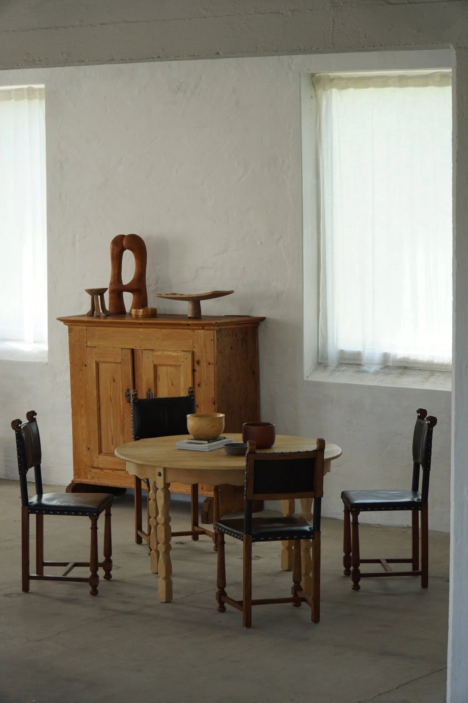 Set_of_8_Swedish_Grace_Dining_Chairs_in_Leather,_Sweden_1920s–1930s