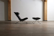 Set_of_Ari_Lounge_Chair_with_Ottoman_by_Arne_Norell_for_Norell_Möbel_AB,_Black_Leather_and_Chrome,_Sweden,_1966