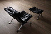 Set_of_Ari_Lounge_Chair_with_Ottoman_by_Arne_Norell_for_Norell_Möbel_AB,_Black_Leather_and_Chrome,_Sweden,_1966