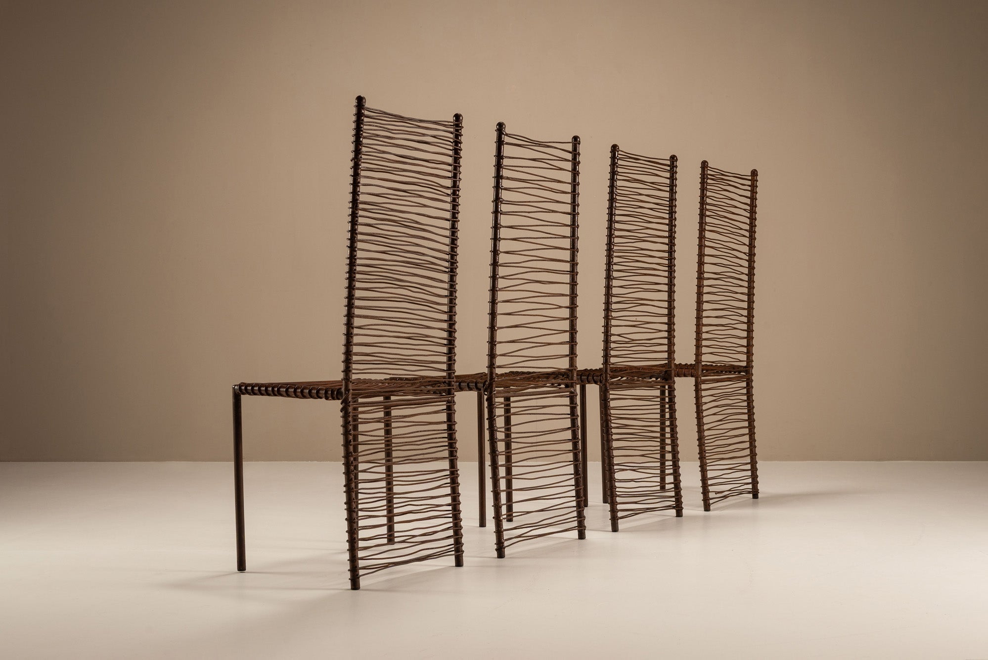 Set_of_Four_Artisanal_French_Iron_Highback_Chairs,_1980s
