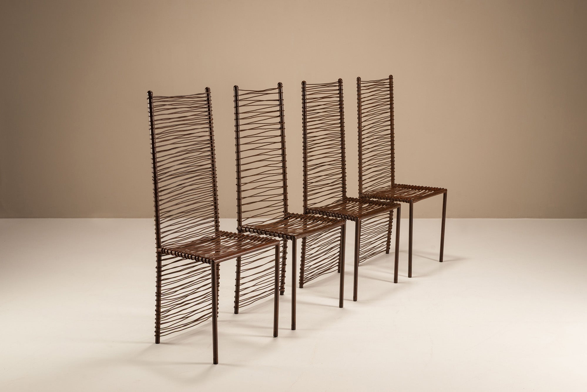 Set_of_Four_Artisanal_French_Iron_Highback_Chairs,_1980s