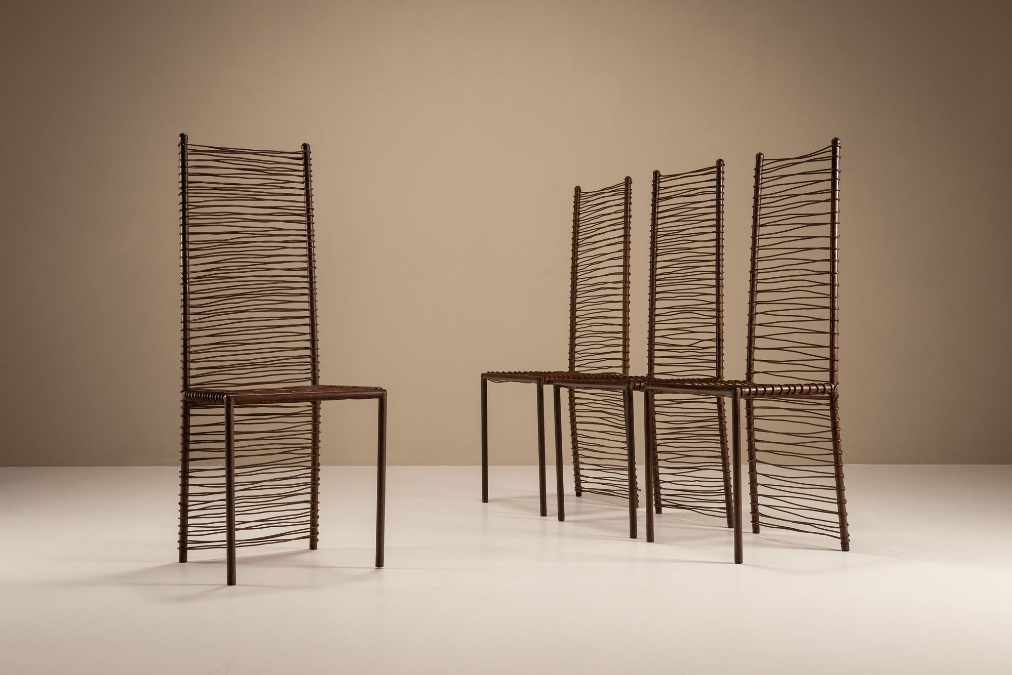 Set_of_Four_Artisanal_French_Iron_Highback_Chairs,_1980s