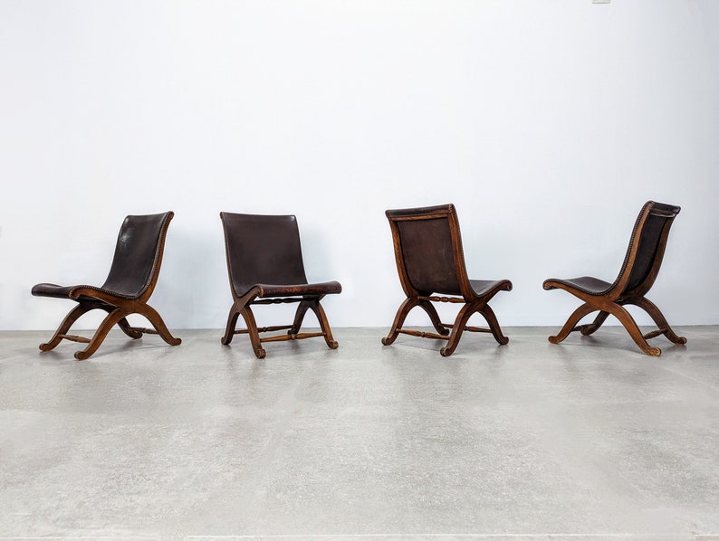 Set_of_4_chairs_by_Pierre_Lottier_for_Almazan_1950s
