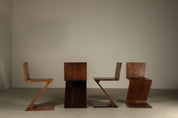 Set_of_4_Handcrafted_Zig-Zag_Chairs_After_Gerrit_Rietveld_in_Dark-Stained_Solid_Wood