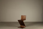 Set_of_4_Handcrafted_Zig-Zag_Chairs_After_Gerrit_Rietveld_in_Dark-Stained_Solid_Wood